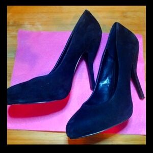 Black kid-suede pumps by BCBGeneration. Size 8 1/2